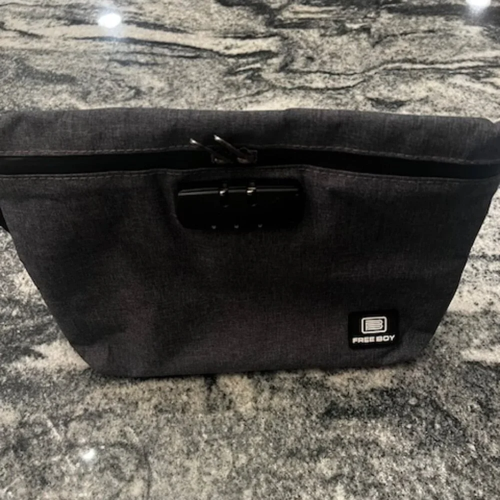 Free Boy Smell Proof Bag, storage pouch designed to contain strong odors. Locks.